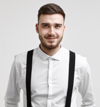 portrait-handsome-friendly-looking-young-corporate-worker-with-stylish-haircut-beard-looking-camera-with-happy-confident-smile-having-good-mood-after-he-got-promoted-job-employment